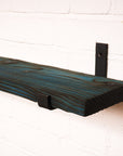 Vibrant radiator shelf showing grain texture and dyed with blue colour for dramatic effect.