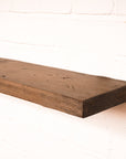 Floating dark wooden shelf 165mm wide made from scaffolding boards