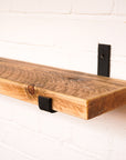 Rustic radiator shelf with hanging brackets using a natural danish oil