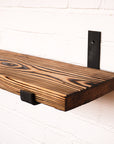 Funky wooden shelf with metal brackets