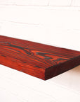 New scaffold board dyed in red with and coated in natural danish oil