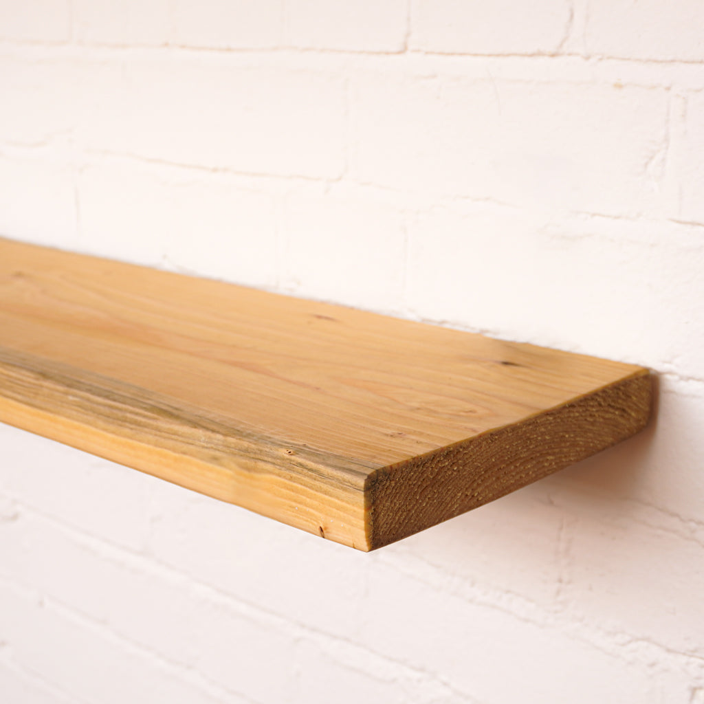 New scaffold board with antique danish oil hanging on wall