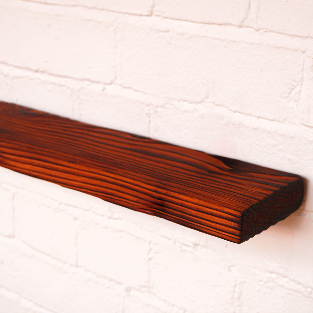 Scaffold board ripped down, charred and coloured with red dye and natural danish oil