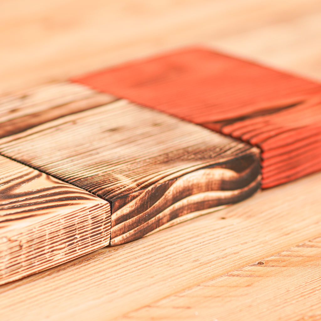 Scaffold board samples in our flamed and charred finish options