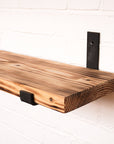 Flamed timber shelf