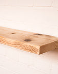 Scaffolding board made into a floating shelf hand sanded finish with no oil allowing you to choose the finish needed