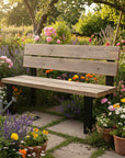 Outdoor Wooden bench in a garden with flowers and plants with metal legs
