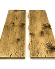 Jointed boards pulled apart to show biscuiting process