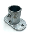 Vertical foot socket for steel rail attaching to hard standing