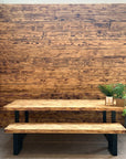 Flamed scaffold boards used as wall cladding