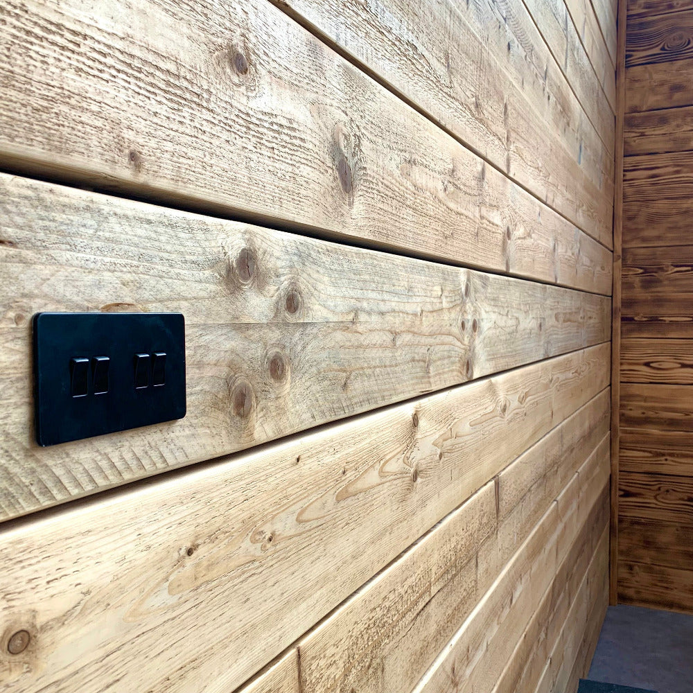 Oiled and sanded timber with cut out for light switch on internal wall