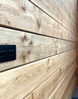 Oiled and sanded timber with cut out for light switch on internal wall