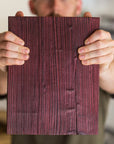 Sample of red coloured and oiled reclaimed scaffold board at The Scaff Shop