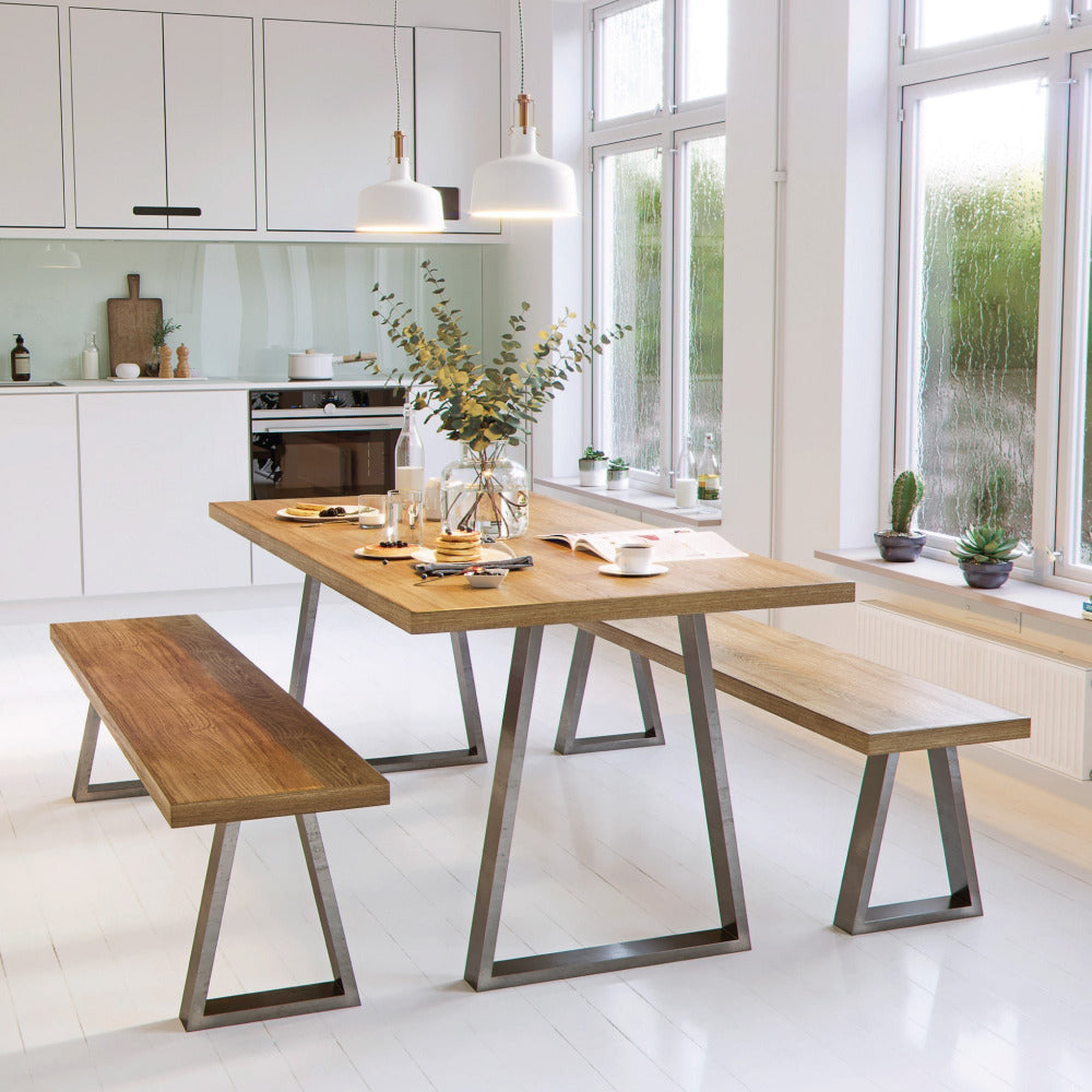 Industrial strength trapezium table legs in kitchen with table and benches