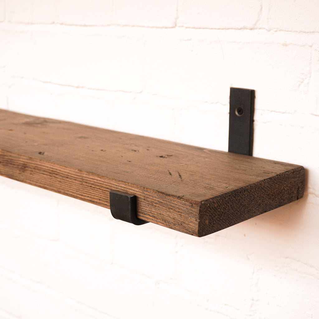 Dark oak colour radiator shelf with metal hanging brackets made from scaffolding boards