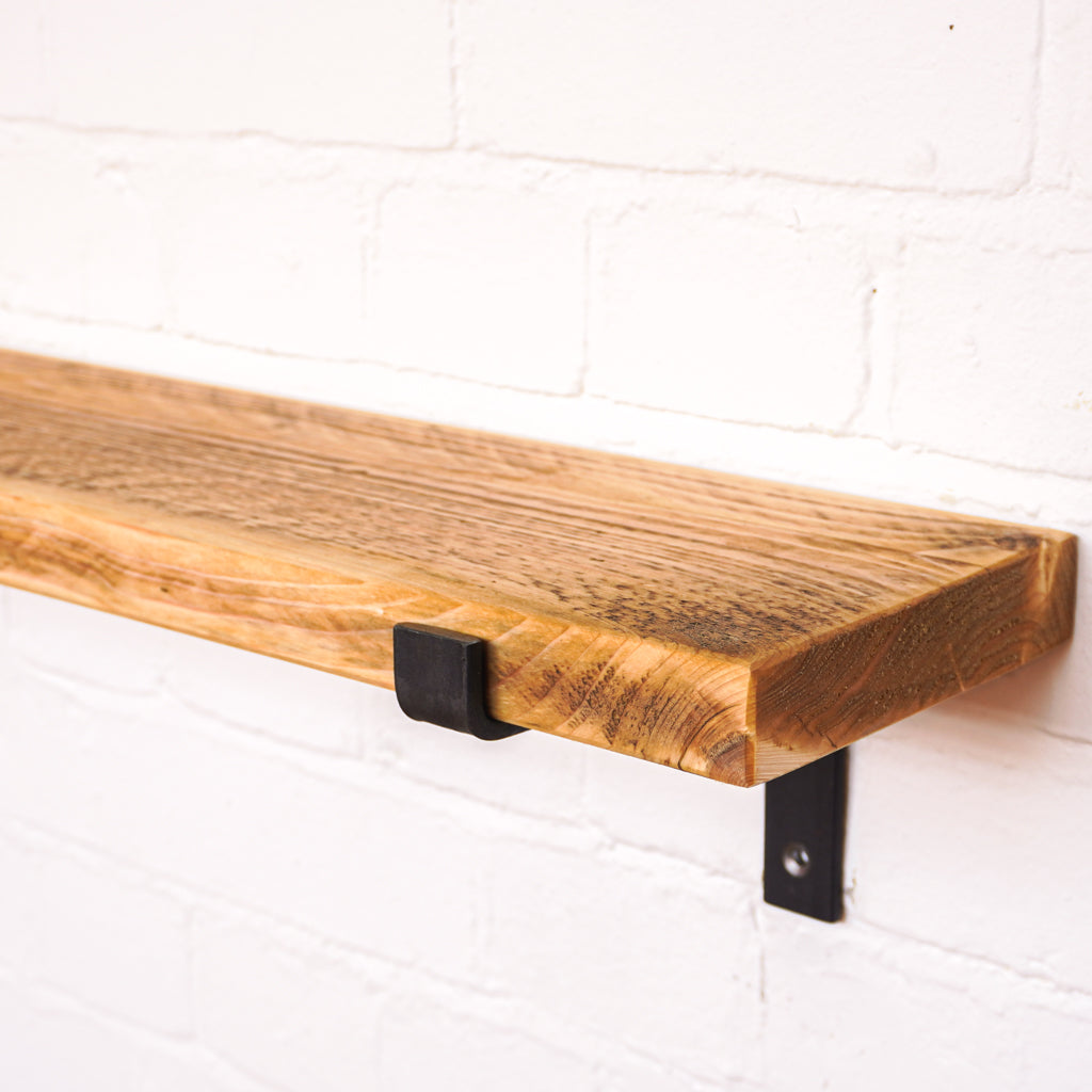 Thick antique looking radiator shelf at 165mm wide with propped metal brackets