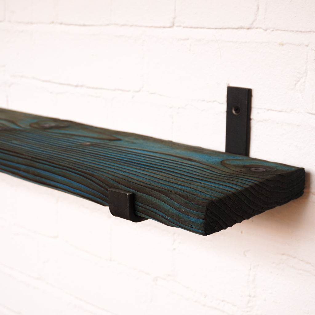 Vibrant radiator shelf showing grain texture and dyed with blue colour for dramatic effect.