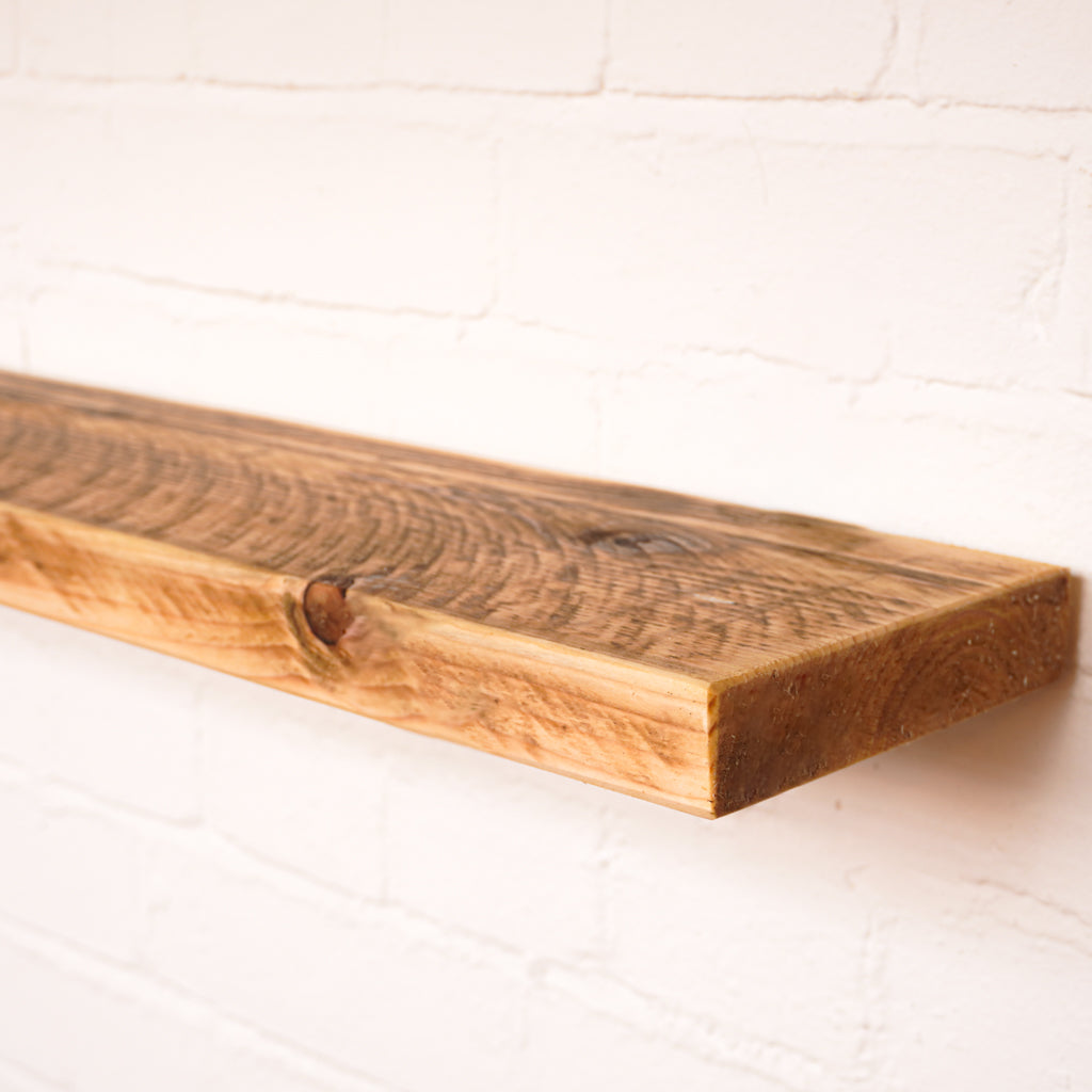 Floating wooden radiator shelf showing all the patina from the reclaimed scaffold board 