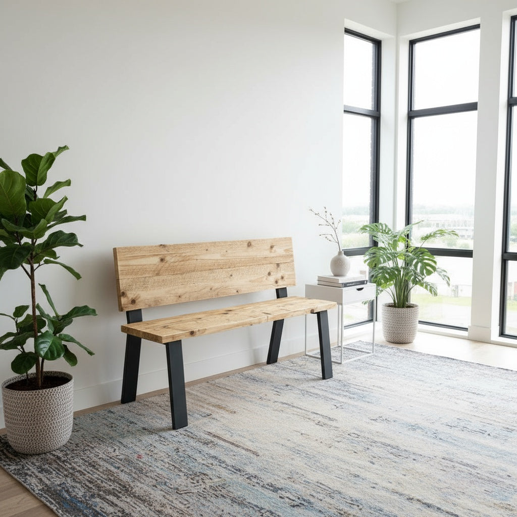 Wooden bench in a modern room with large windows and plants.
