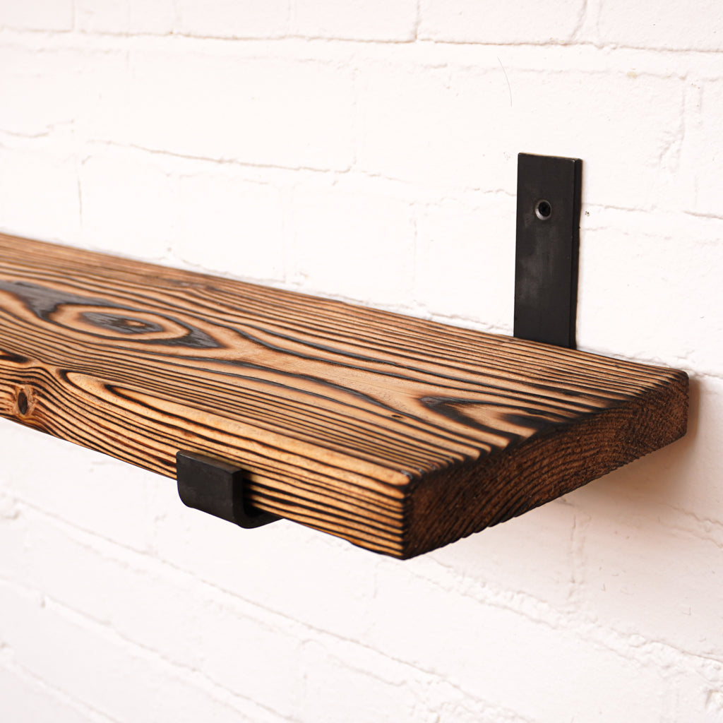 Funky wooden shelf with metal brackets