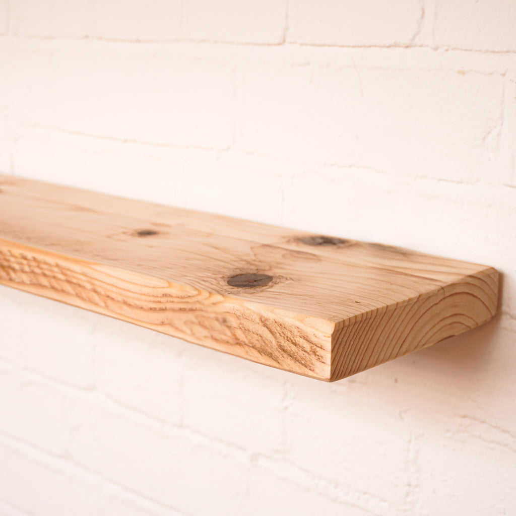 Scaffolding board made into a floating shelf hand sanded finish with no oil allowing you to choose the finish needed