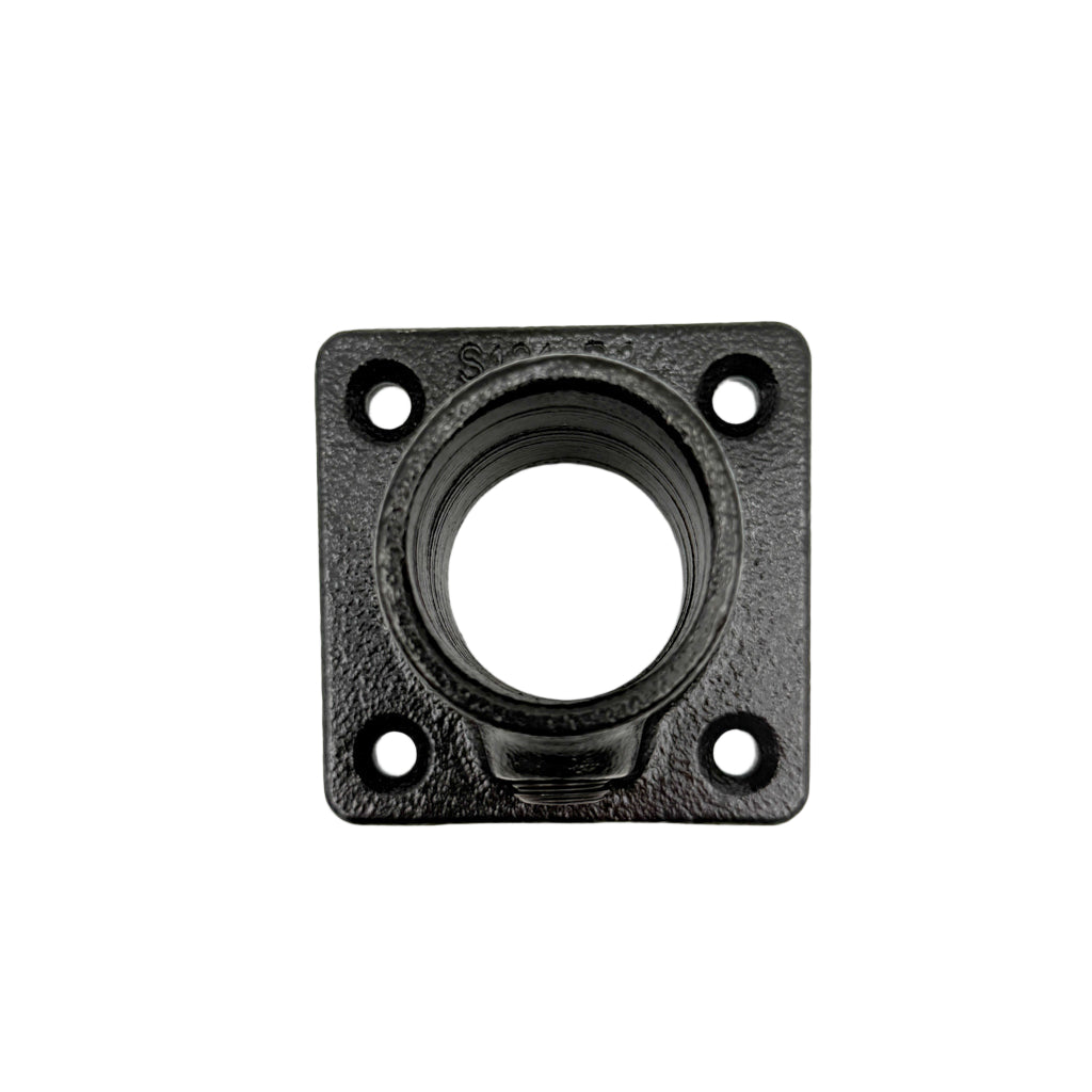 Black metal flange with central circular opening on a white background