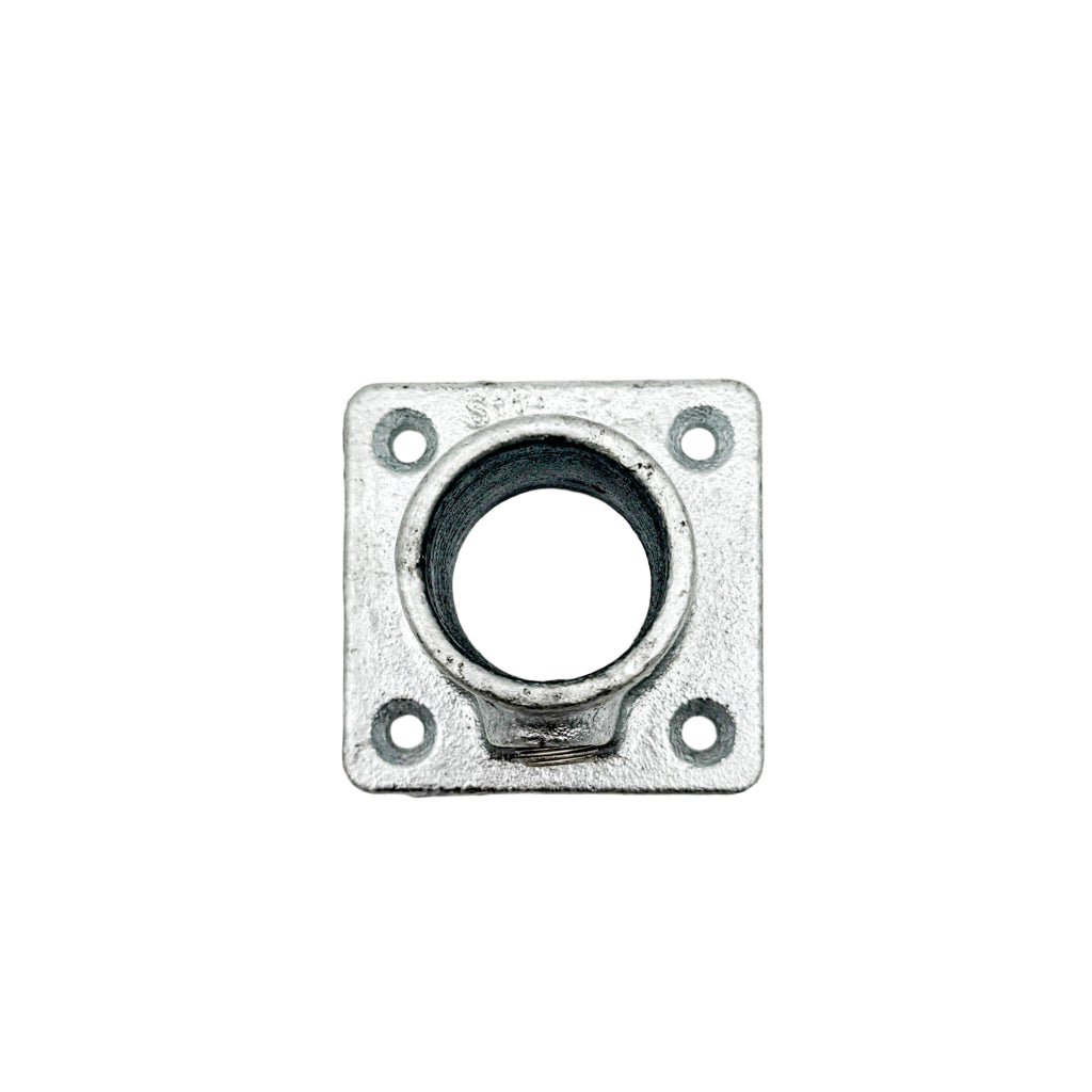 Metallic square socket with round component on a white background
