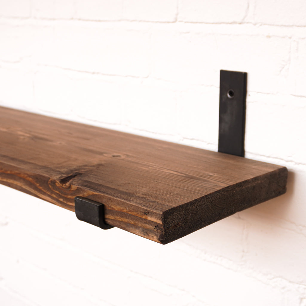 Dark oak shelf with metal brackets