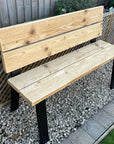 Reclaimed timber outdoor bench with black legs