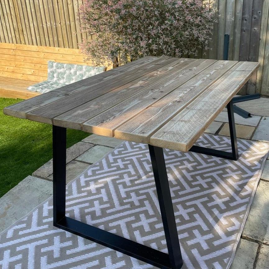 Outdoor table made from reclaimed scaffold boards