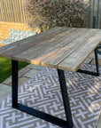 Outdoor table made from reclaimed scaffold boards