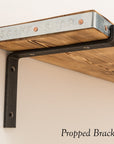 Metal bracket to support reclaimed timber shelf
