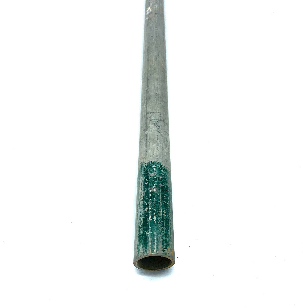 A used scaffolding tube, made of galvanised steel.
