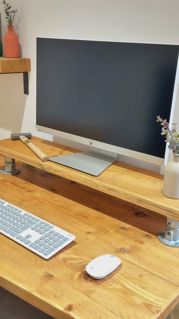 Video of Wooden monitor stand being put away