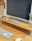 Video of Wooden monitor stand being put away
