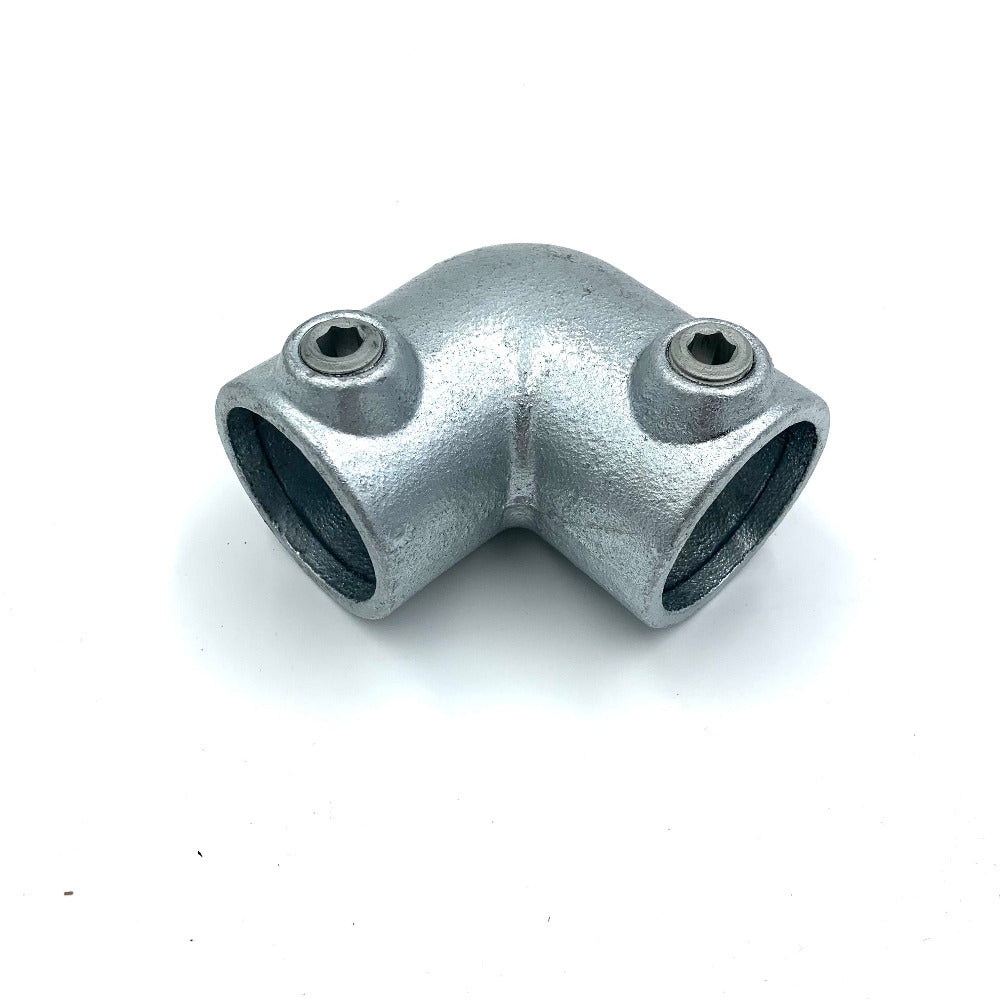Corner tube connector for scaffold poles