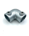 Corner tube connector for scaffold poles