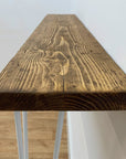 Reclaimed timber stained dark with danish oil to make a console table with hairpin legs