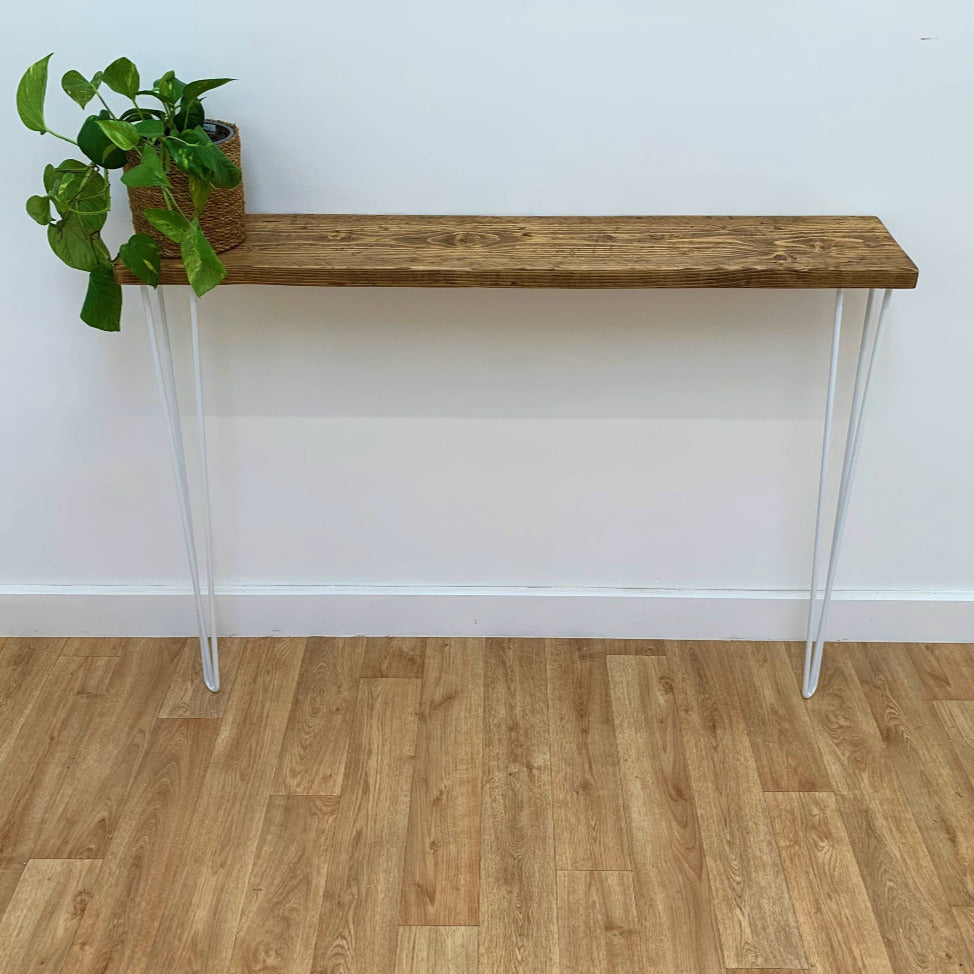 Stylish console table made from reclaimed scaffold boards