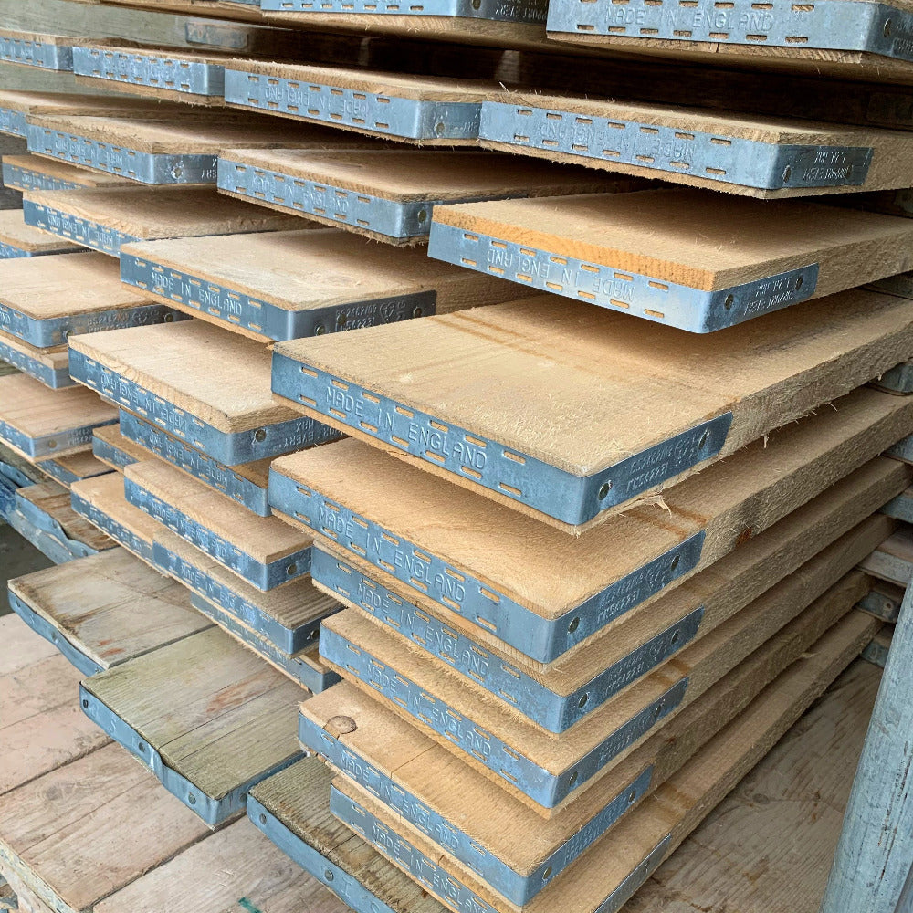 New Scaffold Board with end bands in a stack