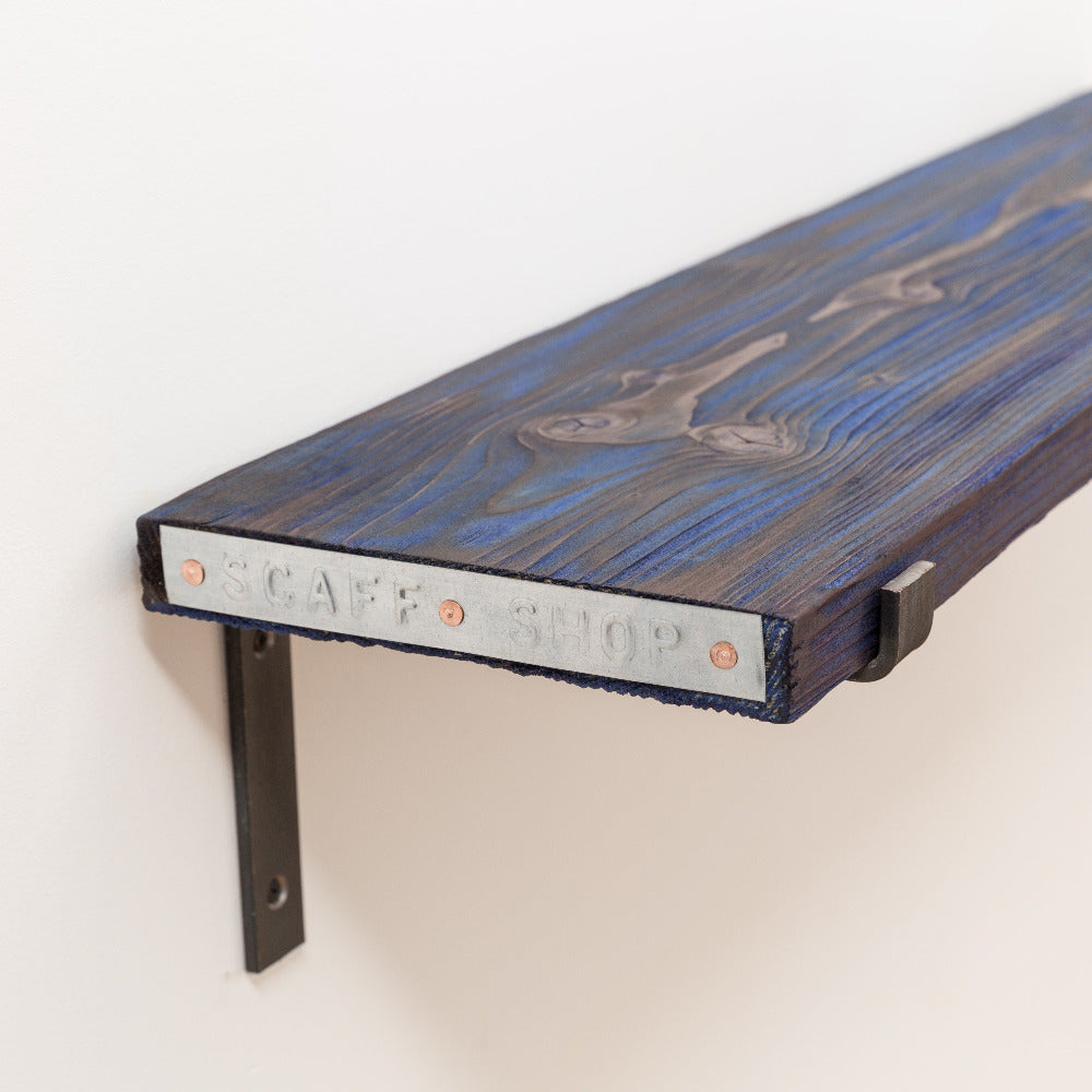 Blue tinted stain for natural sustainable reclaimed timber shelf